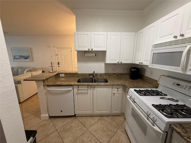 kitchen featuring kitchen peninsula, sink, white cabinets, and white appliances