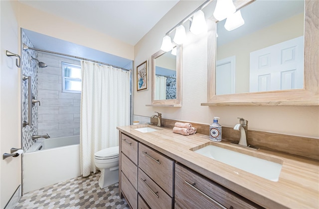 full bathroom with vanity, shower / bath combination with curtain, and toilet