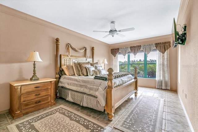 bedroom with ornamental molding and ceiling fan