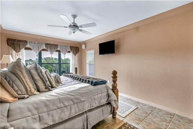 bedroom with crown molding, tile patterned floors, and ceiling fan