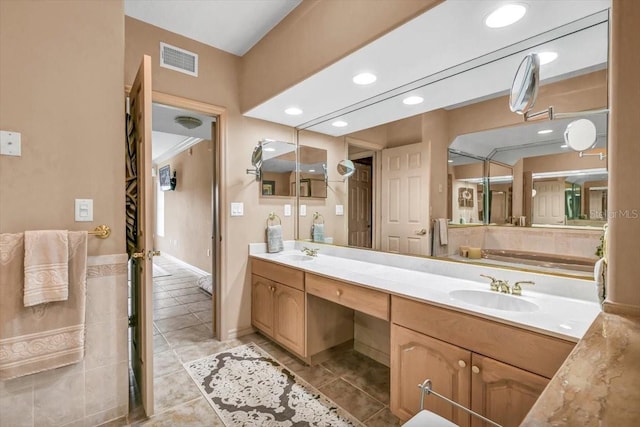 bathroom featuring vanity and tile patterned floors