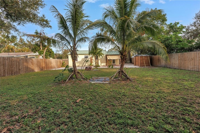 view of yard with a fenced backyard