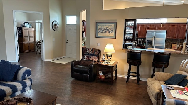 living room with dark hardwood / wood-style flooring