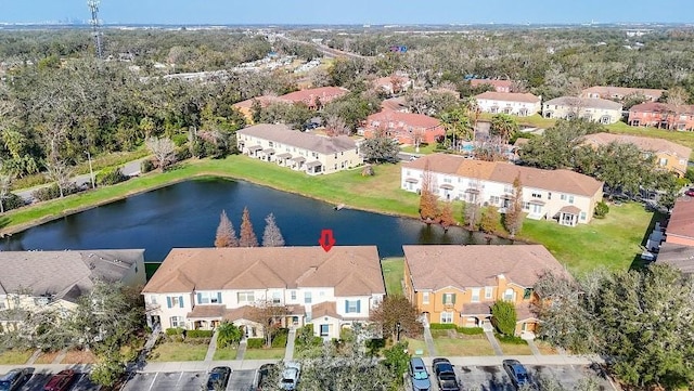 drone / aerial view with a water view