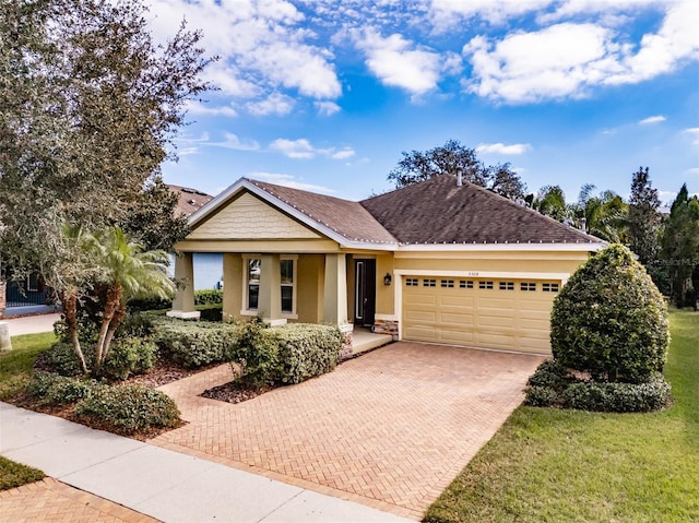 view of front of home with a garage