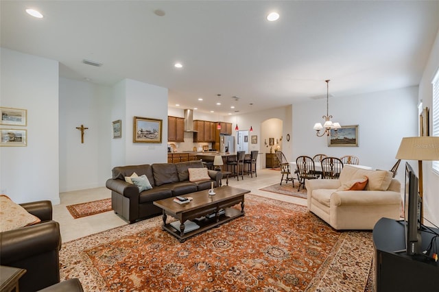 living room featuring a chandelier