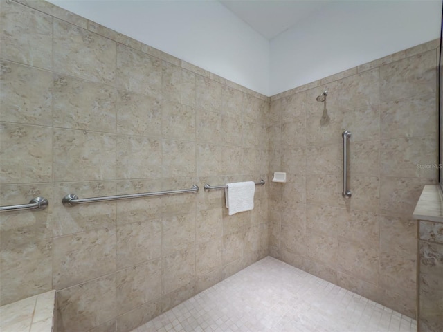 bathroom featuring tiled shower