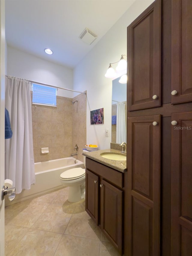 full bathroom with tile patterned flooring, vanity, shower / tub combo with curtain, and toilet