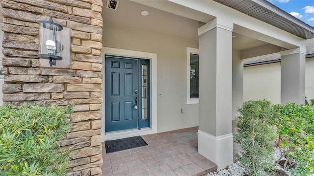 property entrance with a porch