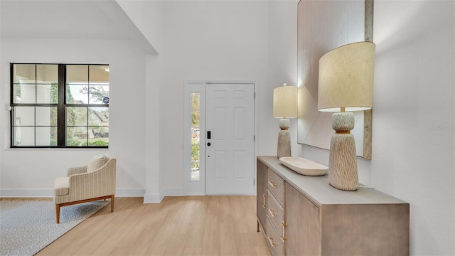 entryway with light hardwood / wood-style flooring