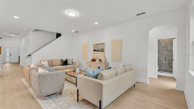 living room with light hardwood / wood-style flooring