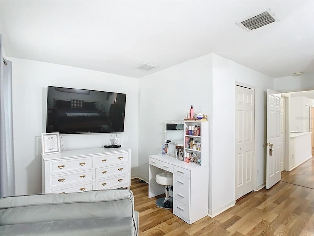 living room with light hardwood / wood-style floors