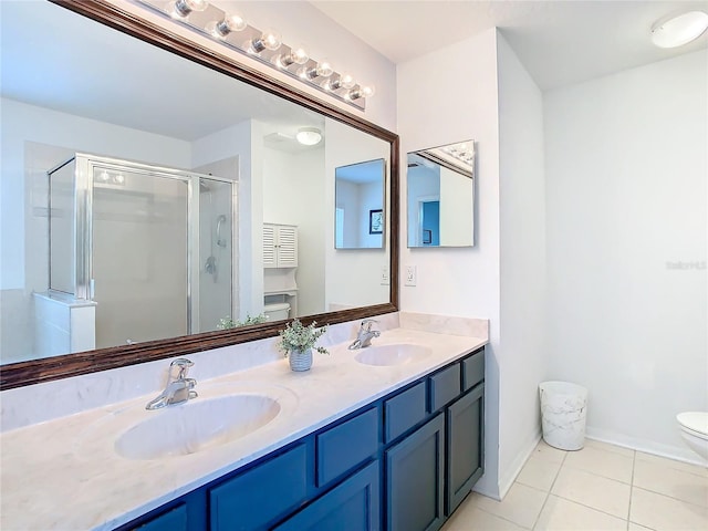 bathroom featuring walk in shower, tile patterned flooring, vanity, and toilet