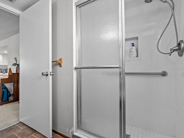 bathroom with an enclosed shower