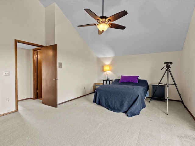 bedroom featuring light carpet, ceiling fan, and lofted ceiling