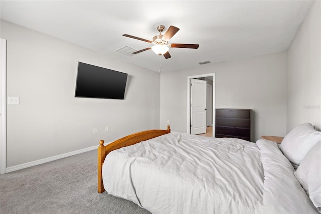 bedroom featuring light carpet and ceiling fan