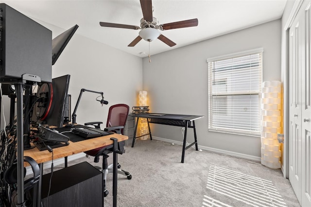 office with light colored carpet and ceiling fan