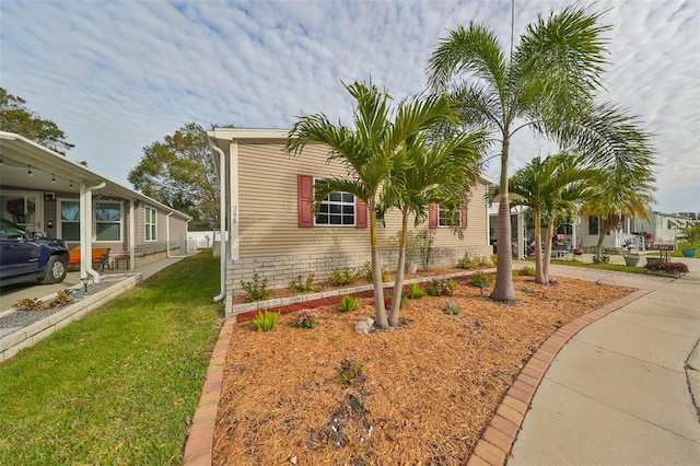 view of property exterior featuring a yard