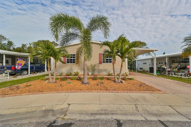 view of front of property with a carport