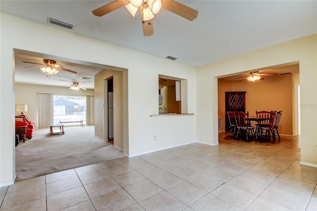 spare room featuring light tile patterned floors