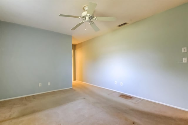 carpeted empty room with ceiling fan