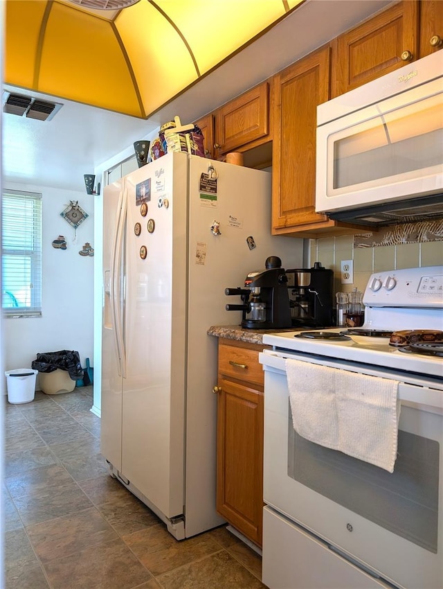 kitchen featuring white appliances