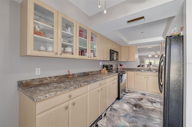 kitchen featuring a tray ceiling, crown molding, sink, black appliances, and light brown cabinets