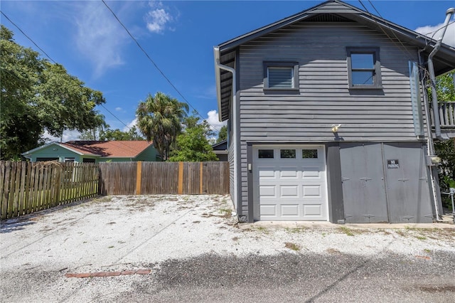 view of home's exterior with a garage