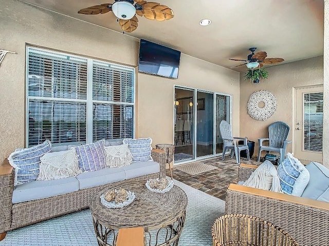 view of patio / terrace with outdoor lounge area and ceiling fan