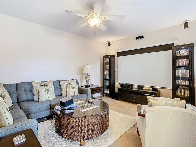 living room with carpet floors and a ceiling fan