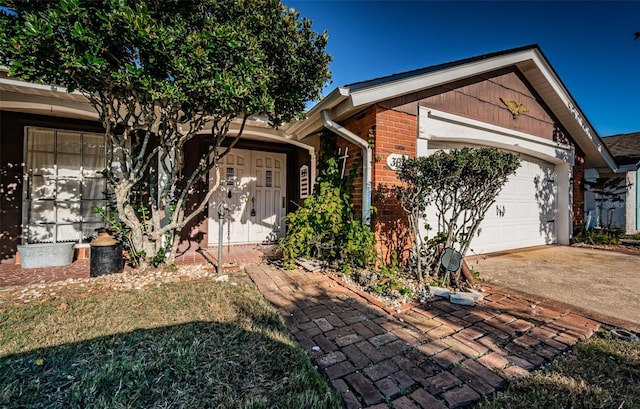 single story home featuring a garage