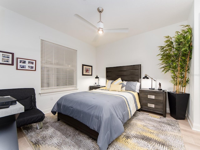 bedroom featuring ceiling fan and hardwood / wood-style floors