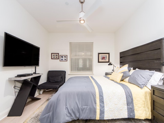 bedroom featuring ceiling fan and wood-type flooring