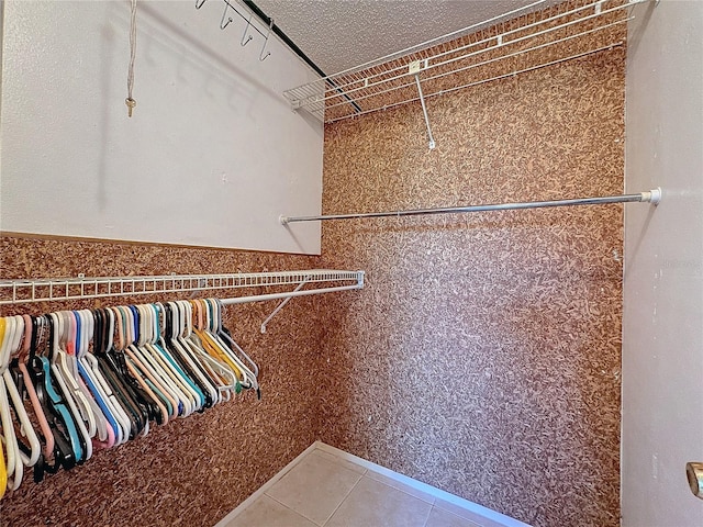 walk in closet featuring tile patterned floors