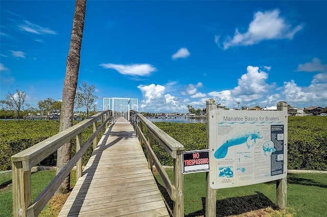 surrounding community featuring a water view