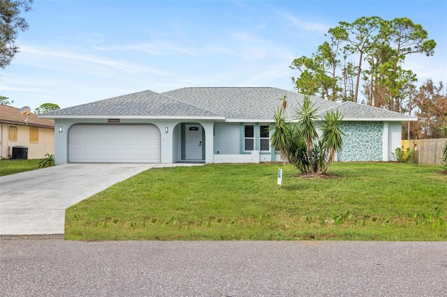 single story home with a front lawn, cooling unit, and a garage