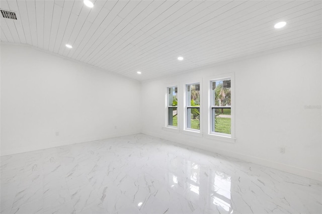 spare room with wood ceiling