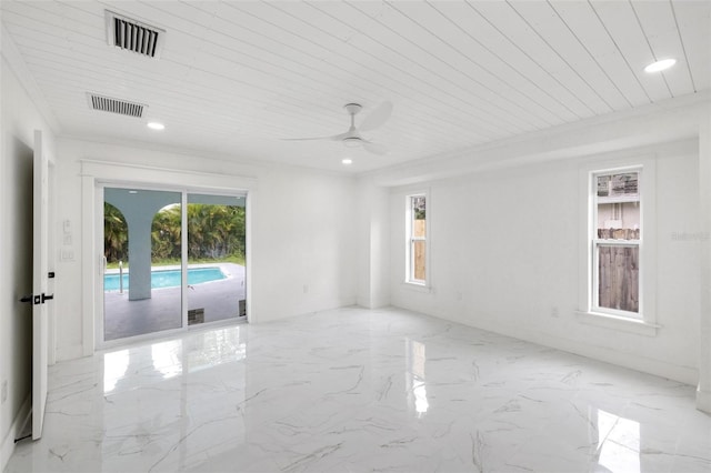 empty room featuring crown molding, ceiling fan, plenty of natural light, and wooden ceiling