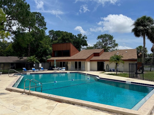 view of pool featuring a patio