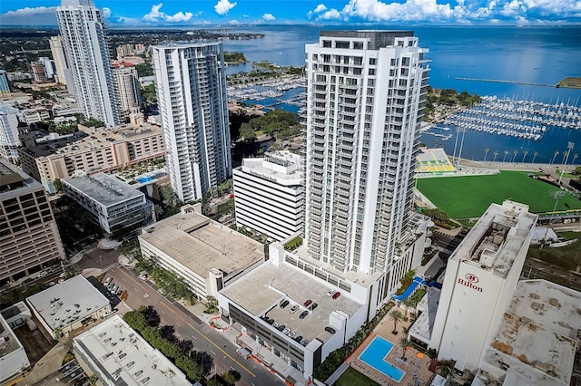 birds eye view of property with a water view