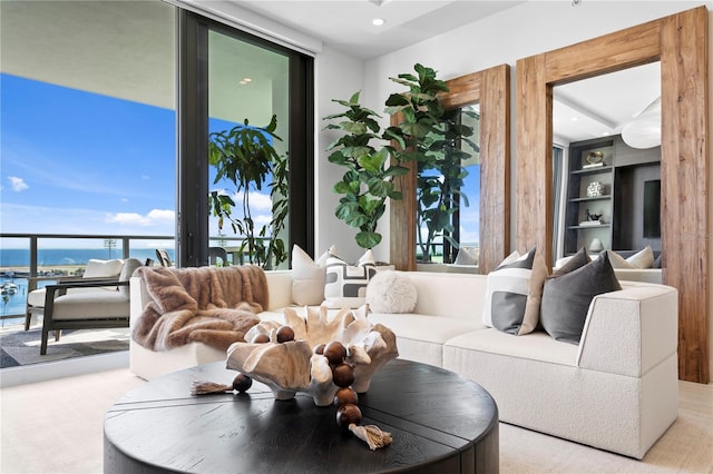 301 1st St S Unit 1002, Saint Petersburg, FL 33701 - living area featuring floor to ceiling windows, built in features, and carpet flooring