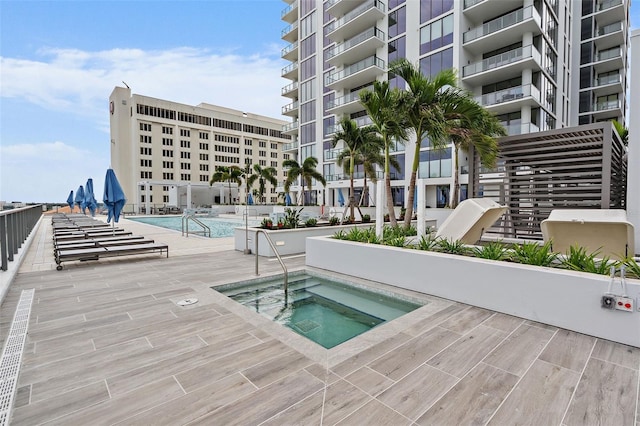 301 1st St S Unit 1002, Saint Petersburg, FL 33701 - pool with a community hot tub