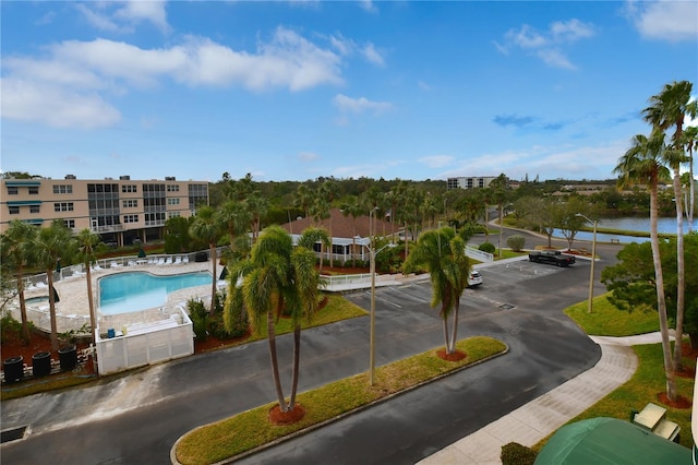 birds eye view of property featuring a water view