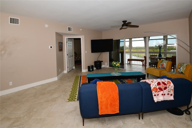 living room featuring ceiling fan