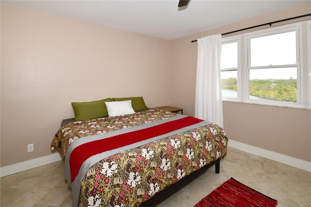 bedroom featuring ceiling fan