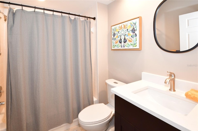 full bathroom with vanity, shower / bath combination with curtain, and toilet