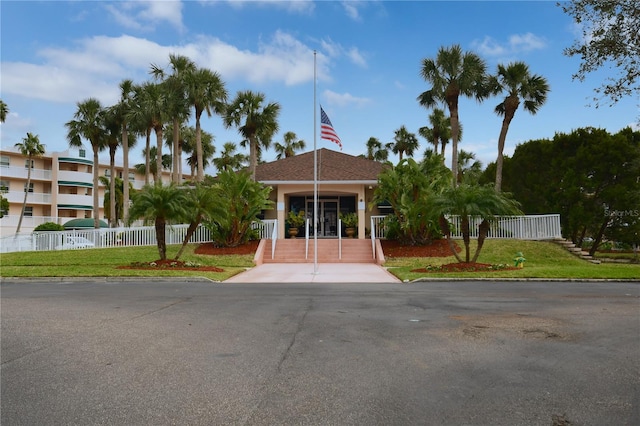 view of front of home with a front yard