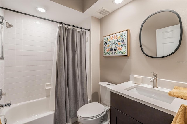 full bathroom featuring vanity, toilet, and shower / bath combo with shower curtain