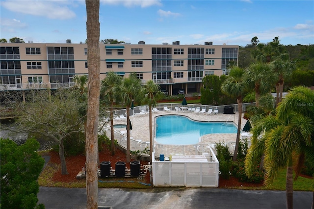 view of pool featuring a patio