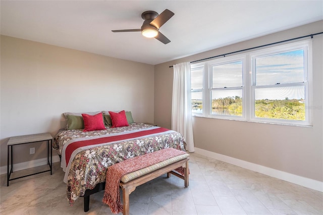 bedroom featuring ceiling fan